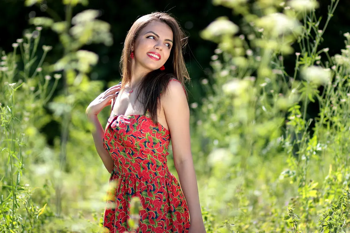 woman smiling in field